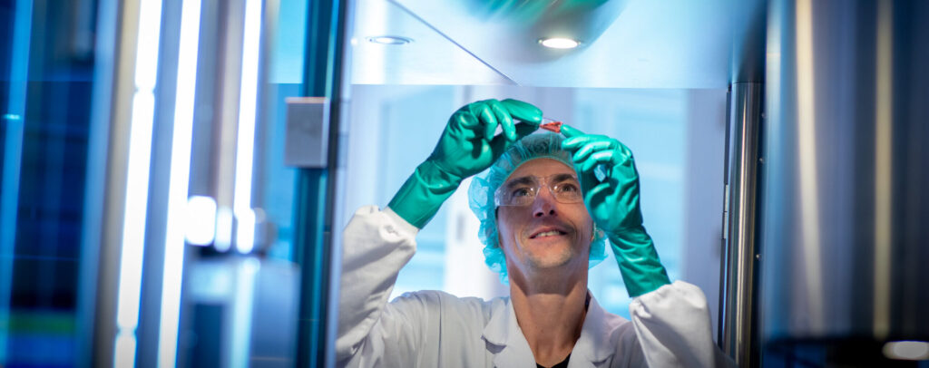 BBIO- man looking at liquid